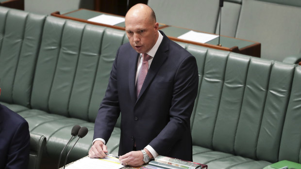 Home Affairs Minister Peter Dutton speaking in the House of Representatives, denying any personal connection to a series of interventions in visa cases.