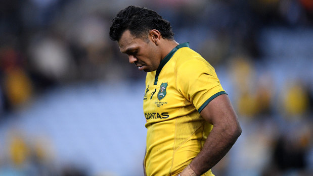 Feeling the pinch: Wallabies star Kurtley Beale has returned early from a holiday to answer questions surrounding a video which shows him in the presence of a group of men passing around a plate with white powder.