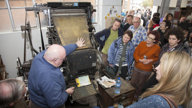 Laurie Harding demonstrates the operation of a Linotype machine at the 2009 fundraiser for the museum.