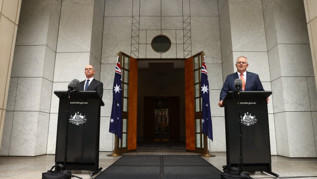Prime Minister Scott Morrison and Chief Medical Officer Paul Kelly on Friday.
