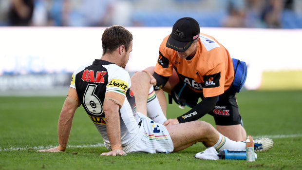 Downgraded: James Maloney is treated for the knee injury that was initially feared would sideline him for up to six weeks.