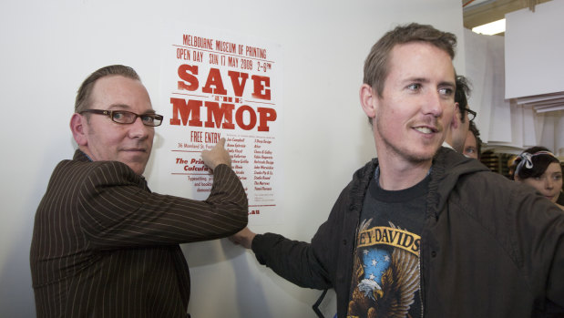Print-based artist Jon Campbell, left, at the 2009 "Save the MMoP" fundraiser.