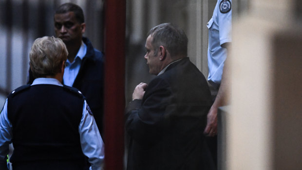 Boris Kunsevitsky leaves the Supreme Court into police custody.