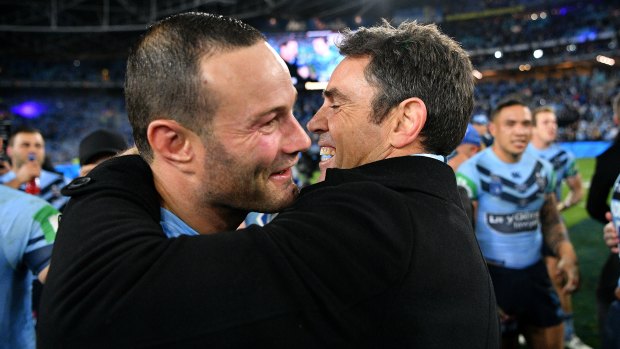 Boyd Cordner and Brad Fittler embrace after the captain and coach helped lead NSW to a series victory in 2019.
