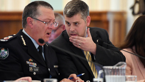 Queensland Police Commissioner Ian Stewart (left) with Queensland Police Minister Mark Ryan at estimates hearings this week.