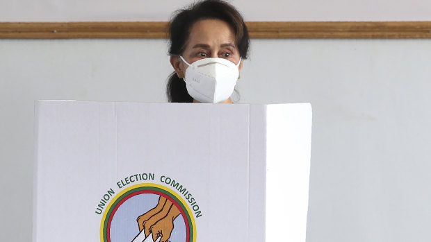 Myanmar's leader Aung San Suu Kyi votes ahead of Sunday's general election in Naypyitaw.