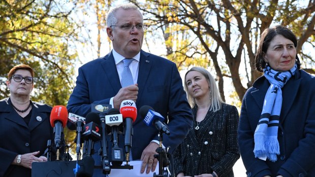 Prime Minister Scott Morrison and NSW Premier Gladys Berejiklian address the media in Richmond on Monday.