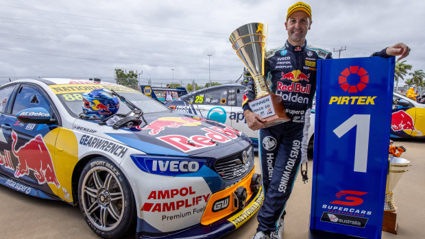Jamie Whincup of the Red Bull Holden Racing Team celebrates after winning race 20 during the Townsville SuperSprint.
