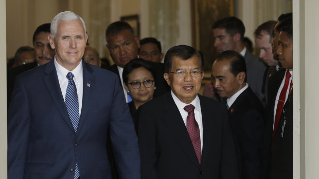 Former Indonesia vice president Jusuf Kalla (right) with his then US counterpart Mike Pence in Jakarta in 2017.
