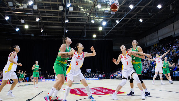 Shooting for the stars: Australia's Cayla George (left), and Rebecca Allen in action for the Opals against China in September, 2019.