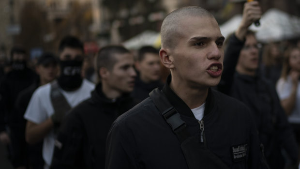 Members of nationalist movements march during a rally marking Defender of Ukraine Day in Kiev in 2018.