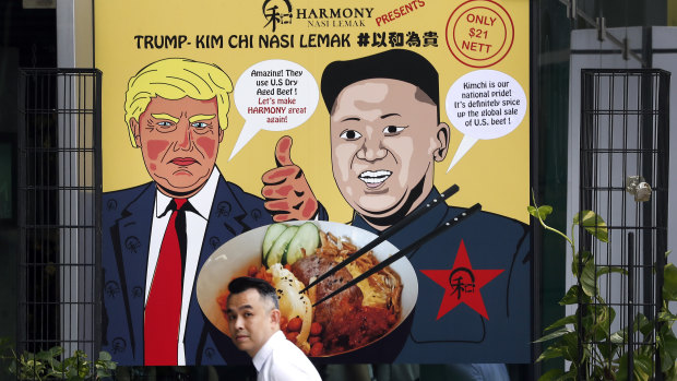 An advertising board in Singapore features Donald Trump and Kim Jong-un advertising a "Trump Kim Chi" dish.