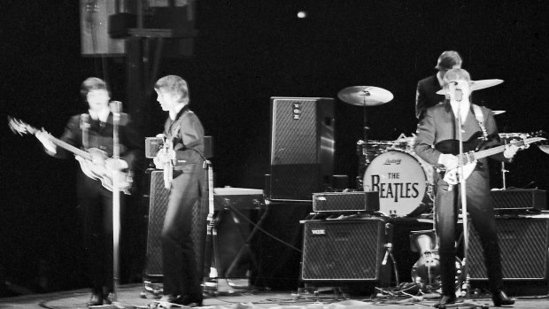 The Beatles perform at Sydney Stadium, 18 June 1964.