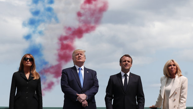 US President Donald Trump, first lady Melania Trump, French President Emmanuel Macron and his wife Brigitte Macron attend a ceremony to mark the 75th anniversary of D-Day.