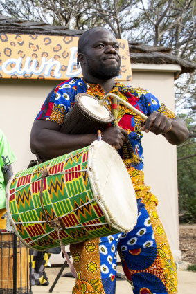 Dance to African rhythms at the Saturday Village Market.