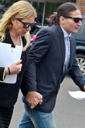 Lizzie Buttrose and Zoran Stopar seen leaving court in 2017.