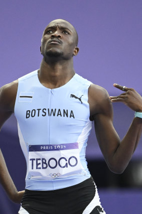 Letsile Tebogo celebrates his win in the men’s 200m.