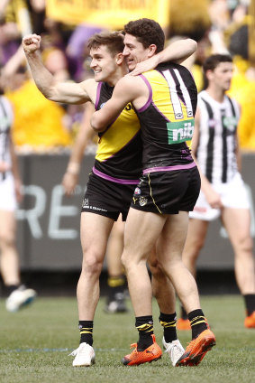 Short (left) celebrates one of his trademark long goals with Jason Castagna. 