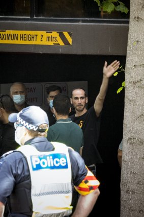 Mr Azimitabar walks out of the hotel on Thursday.