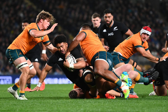 New All Blacks skipper Ardie Savea is tackled in the first Test.