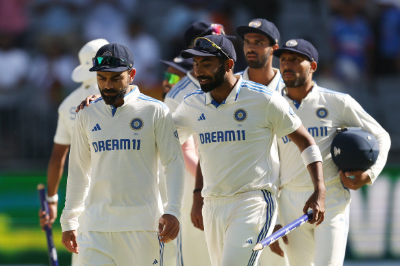 India celebrate their big win in the first Test at Perth.