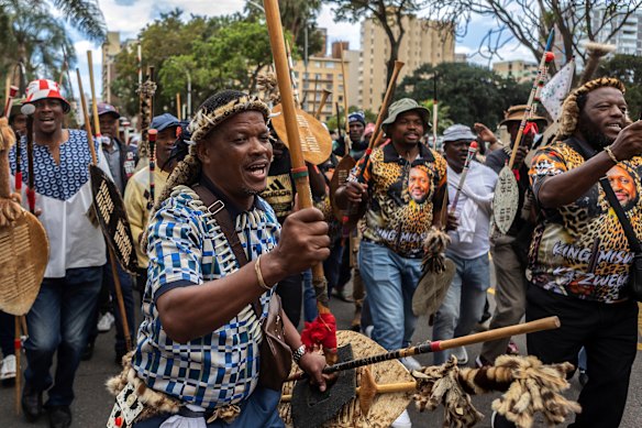 Crowds of anti-illegal immigration protesters demonstrate in the streets in Durban on September 30.