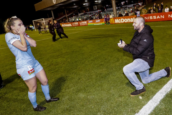 Matt Stonham proposes to Melbourne City’s Rhali Dobson after her W-League game against Perth.