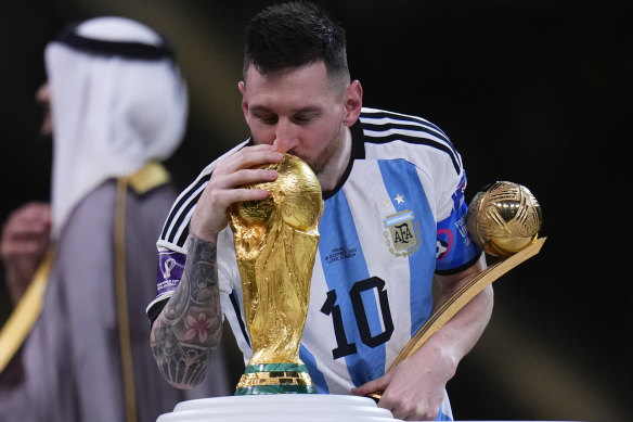 Lionel Messi – finally – gets his hands, and his lips, on the World Cup.