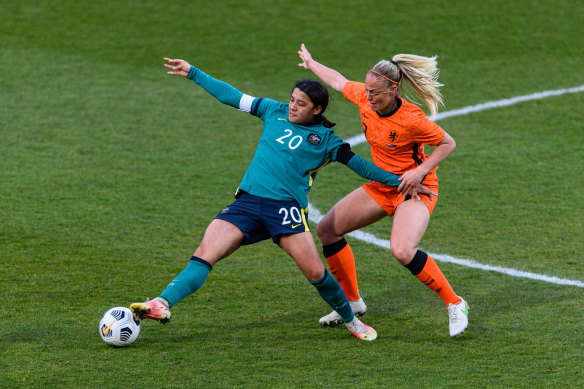 The Netherlands’ Stefanie van der Gragt  (right) is hot on the heels of Australia’s Sam Kerr.