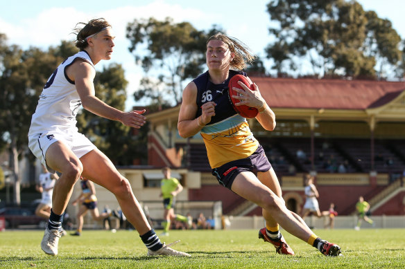 The Bendigo Pioneers’ Harley Reid runs with the ball during the clash with the Geelong Falcons.