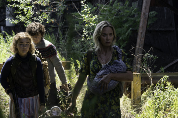 Regan (Millicent Simmonds), Marcus (Noah Jupe) and Evelyn (Emily Blunt) brave the unknown in A Quiet Place Part II.