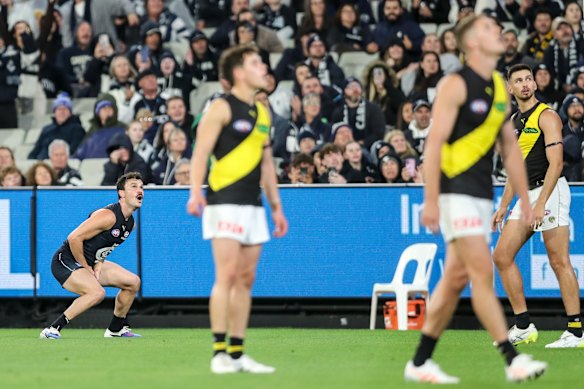 Zac Williams wills his shot on goal through.