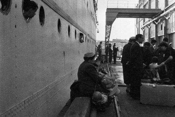 A ship docks in Sydney Harbour bringing hundreds of Italian immigrants to start new lives in Australia in August 1956.