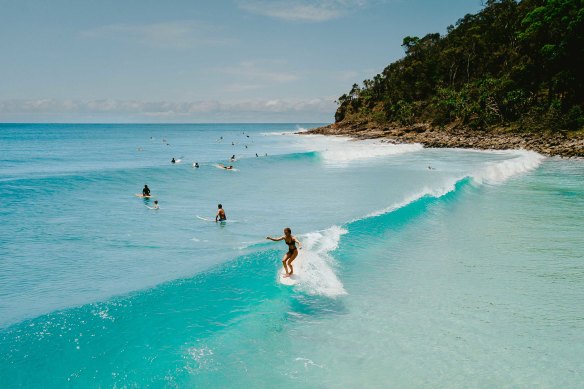 Enjoy a surf in Noosa National Park.