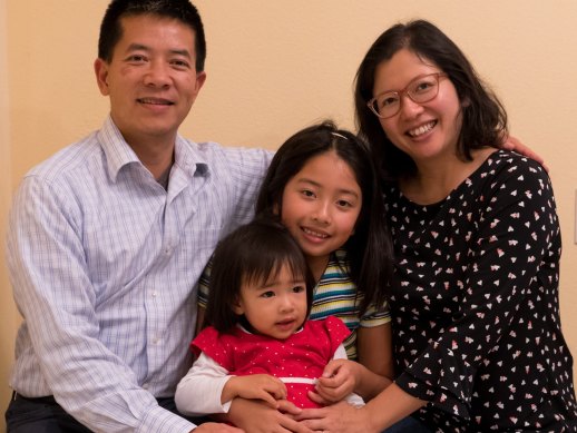 Giang Pham with husband Tien, young daughter (red) Minh-Ha, 3, and elder daughter Sung, 9.