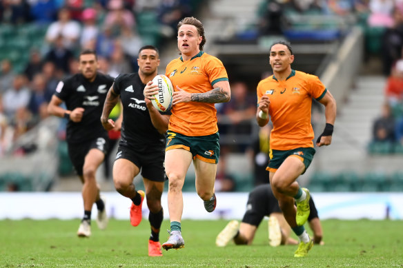 Corey Toole makes a break against New Zealand in the London Sevens final.