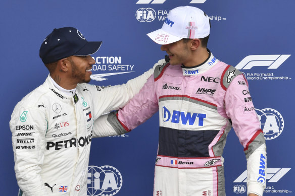 Lewis Hamilton congratulates Esteban Ocon (right, then driving for Force India) on his third place in qualifying at Spa last year.