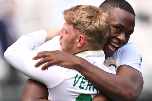 Kagiso rabada and kyle torrenne celebrate.