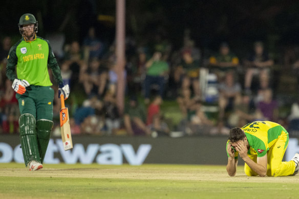 Australia's bowler Pat Cummins, right, reacts after dropping a catch off South Africa's batsman Heinrich Klaasen during the second One Day International.