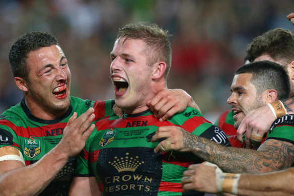 Sam and his younger brother George celebrate during South Sydney’s 2014 Grand Final.