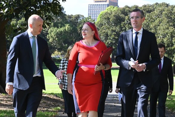 NSW Treasurer Matt Kean, Chair of Domestic Violence NSW Annabelle Daniel and Premier Dominic Perrottet at the domestic violence announcement.