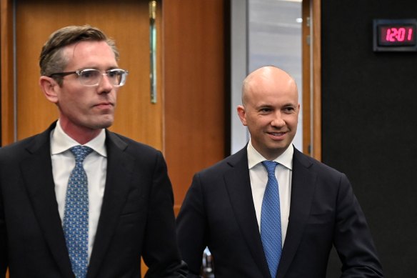 NSW Premier Dominic Perrottet and Treasurer Matt Kean announcing the $250 voucher on Thursday.