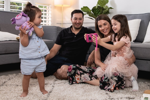 Danielle and Richard Johnson with Violet, 4, and Alice, 1. 