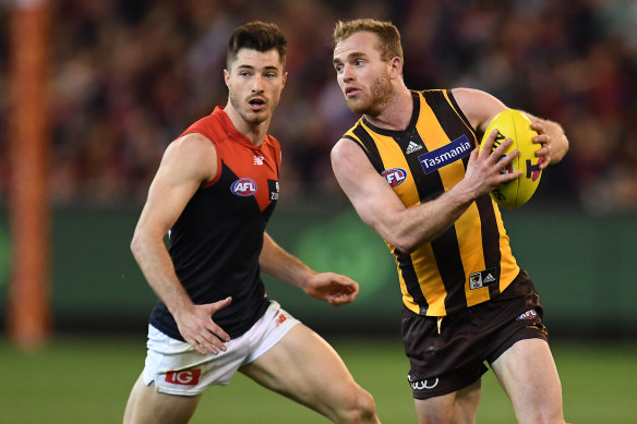 Tom Mitchell, right, plays during the 2018 finals series. 