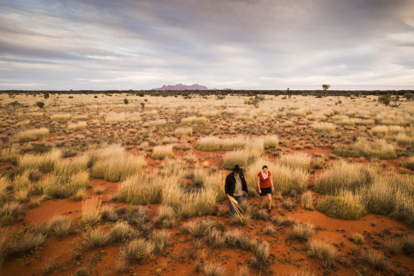 Exploring Uluru-Kata Tjuta National Park with a guide from SEIT Outback Australia.