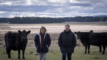 Neighbours Michelle Evans (left) and Janene Skidmore will each have wind turbines about a kilometre from their back fences in Mount Wallace. An existing wind farm is already in operation nearby.
