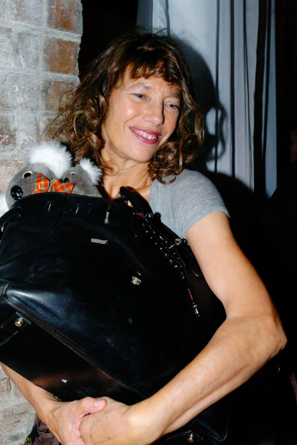 Jane Birkin in Sydney in 2005 with her famous bag, which she always treated like a workhorse, never an ornament.