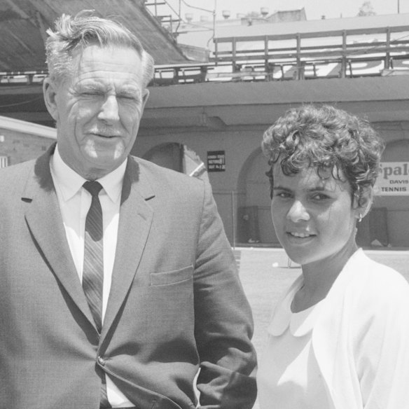 With coach Victor Edwards in 1964, a consistent but controversial figure in her early life.