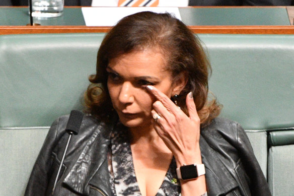 Labor member for Cowan Anne Aly listens to the Leader of the Opposition Bill Shorten delivering the National Apology to survivors of child sexual abuse.
