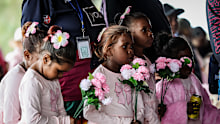  Family and friends of Kumanjayi Little Baby pay their respects to the five-year-old girl.